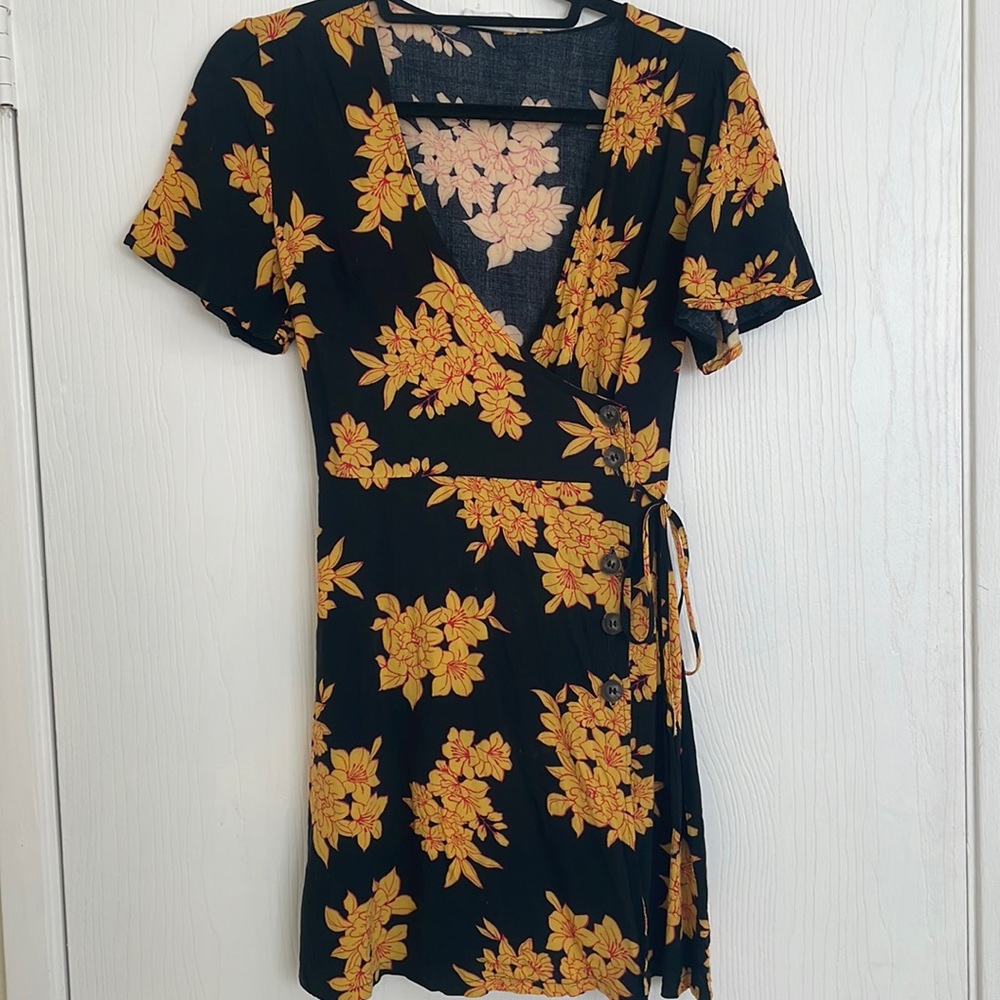All in Favor black floral wrap dress with buttons and tie